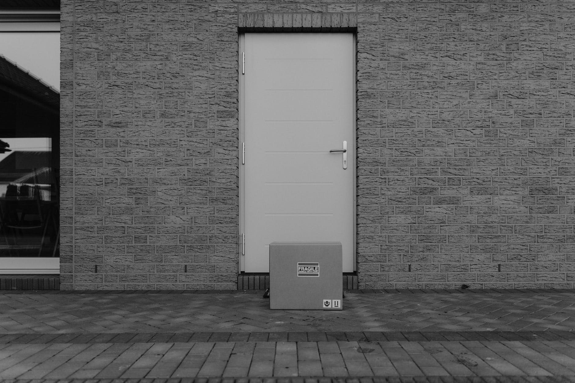 package in front of a closed door
